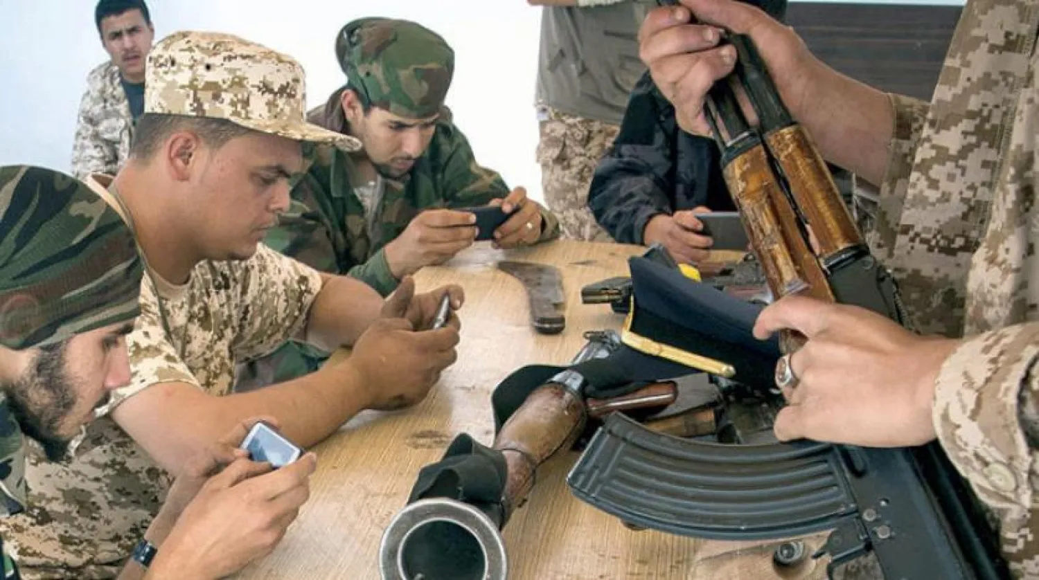 Fighters loyal to the GNA seen during a break from fighting, in a military base in Tajoura, south of the Libyan capital Tripoli on May 1, 2019. FADEL SENNA / AFP