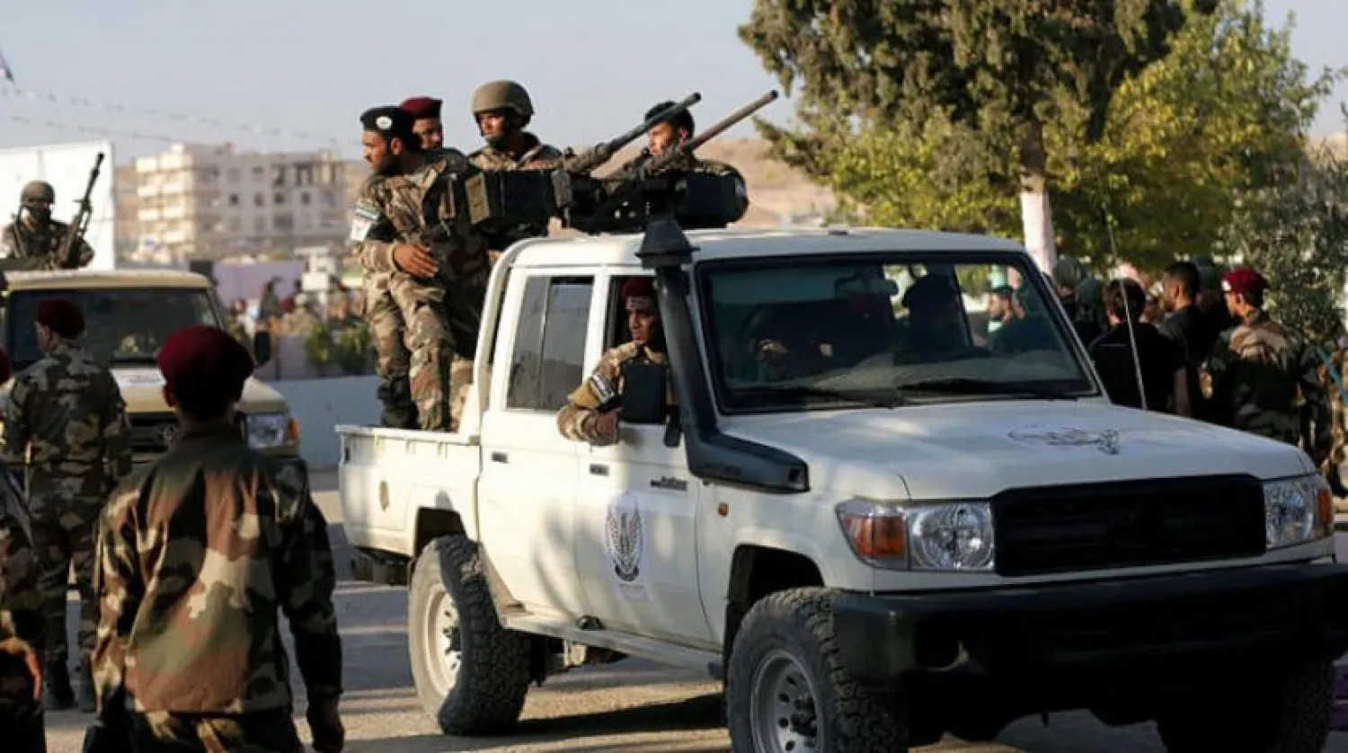 Halep’in kuzeyinde yer alan el-Bab’daki Türkiye destekli Ulusal Ordu’ya bağlı savaşçılar (Reuters)