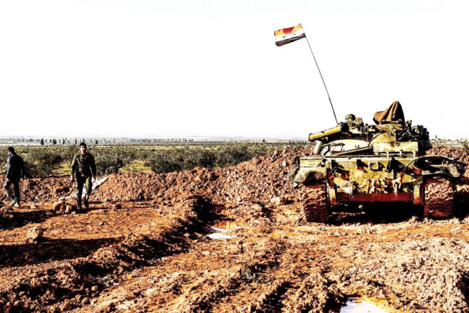 A Syrian government forces’ tank is seen at a position in the village of Qart Saghir northwest of the northern town of Manbij. GEORGE OURFALIAN/AFP
