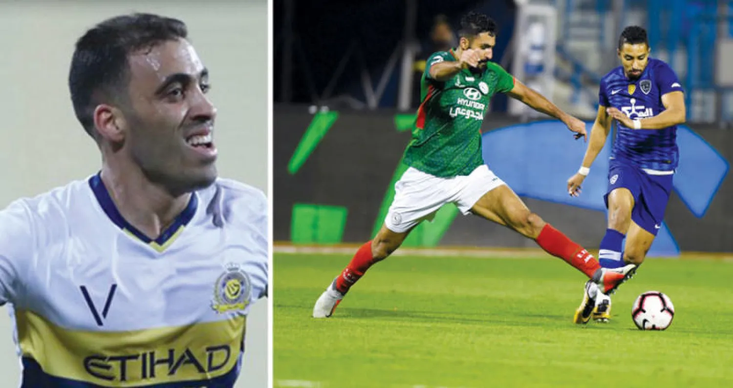 الهلال حافظ على فارق النقطة مع المتصدر بعد فوزه على الاتفاق (تصوير: عيسى الدبيسي)  -  حمد الله قاد النصر إلى فوز مهم أمام الحزم (الشرق الأوسط)