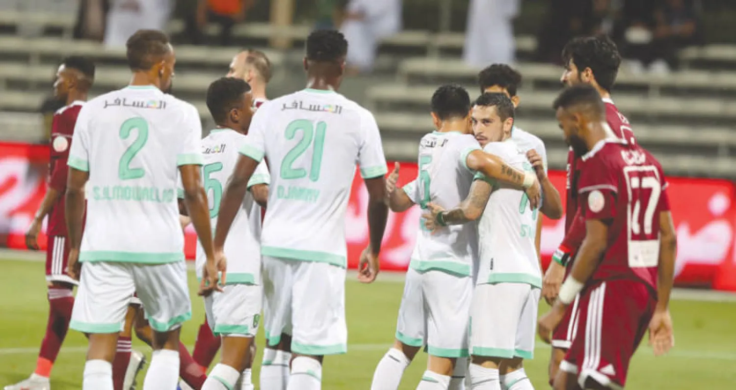 لاعبو الأهلي يحتفلون بأحد أهدافهم أمام الفيصلي (تصوير: بشير صالح)