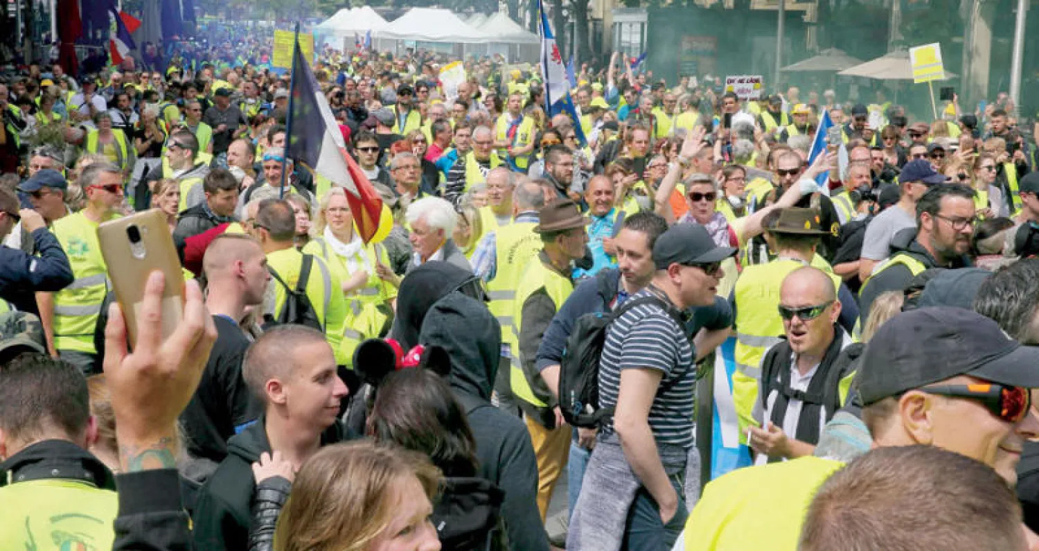 جانب من الاحتجاجات التي شهدتها شوارع رينس أمس (أ.ف.ب)