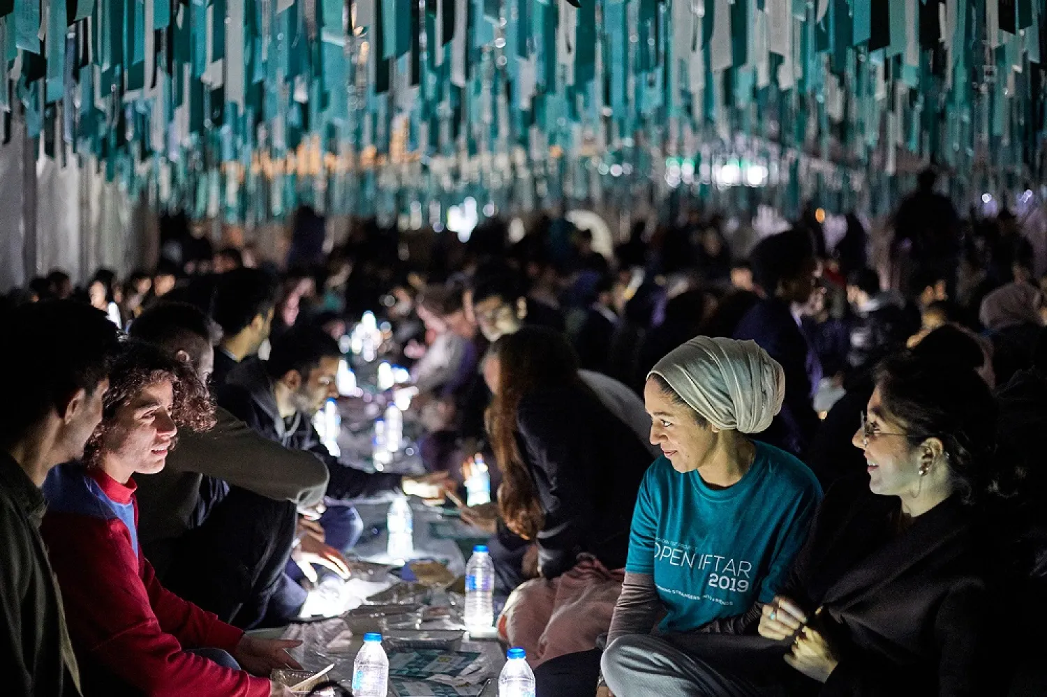 Muslims and non-Muslims gather for an Open Iftar to break their fast during Ramadan. (Ramadan Tent Project)