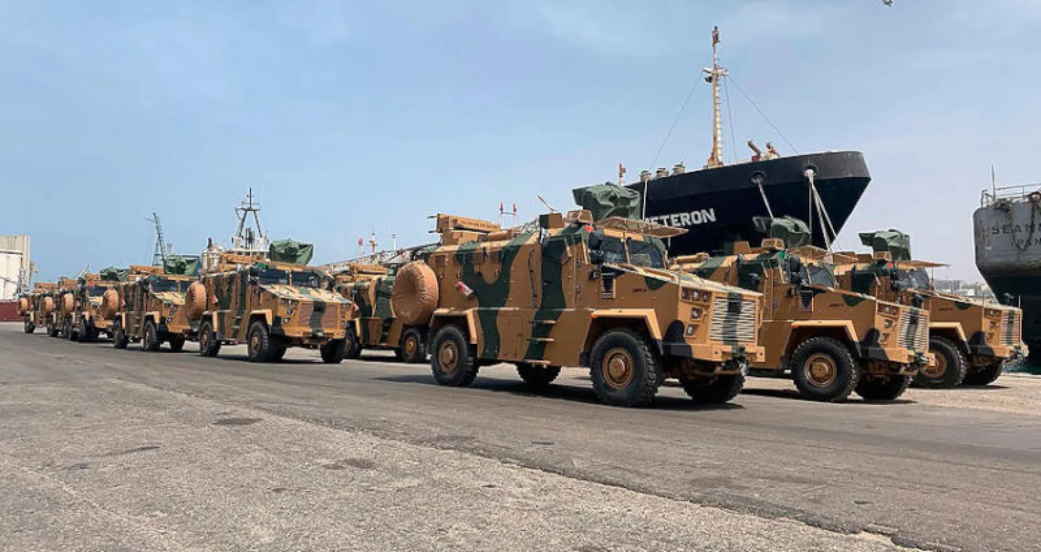 الآليات التركية التي تسلمتها حكومة السراج في مرفأ طرابلس (أ.ف.ب)