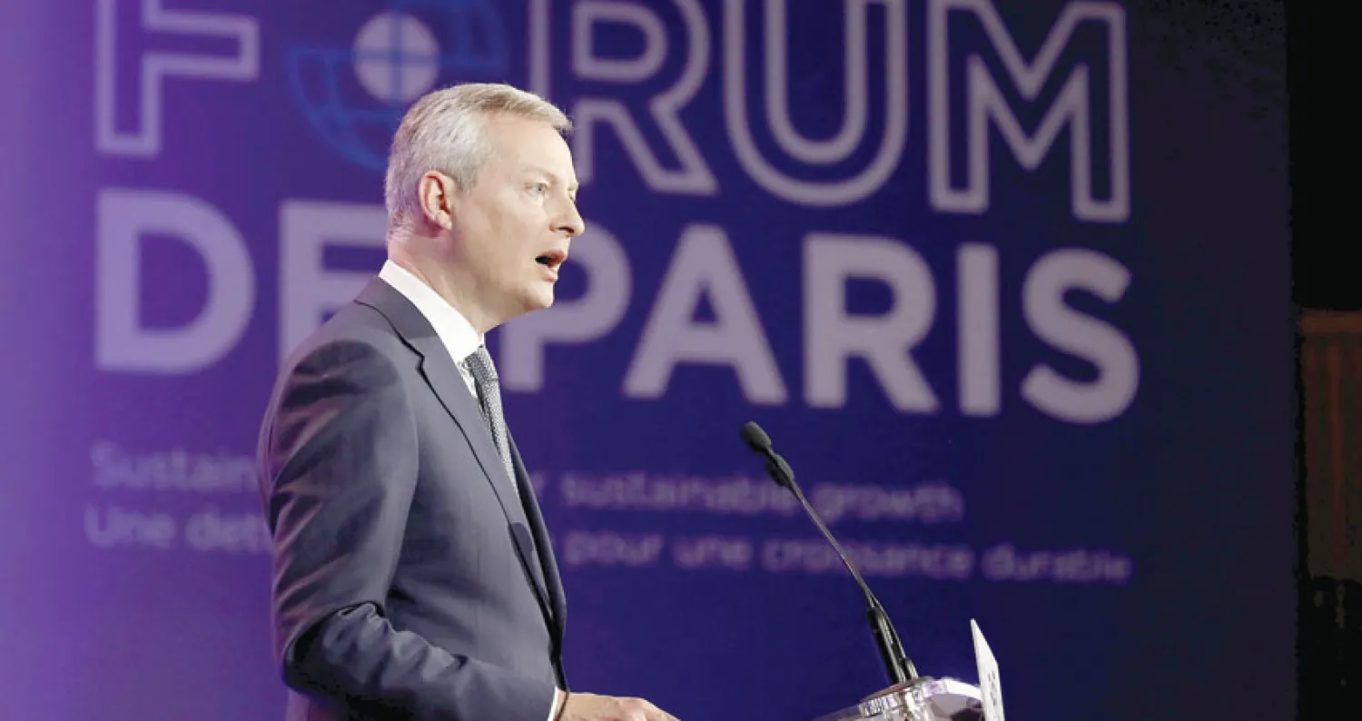 وزير الاقتصاد والمالية الفرنسي برونو لومير يلقي كلمة خلال منتدى بباريس في 7 مايو الحالي (رويترز)