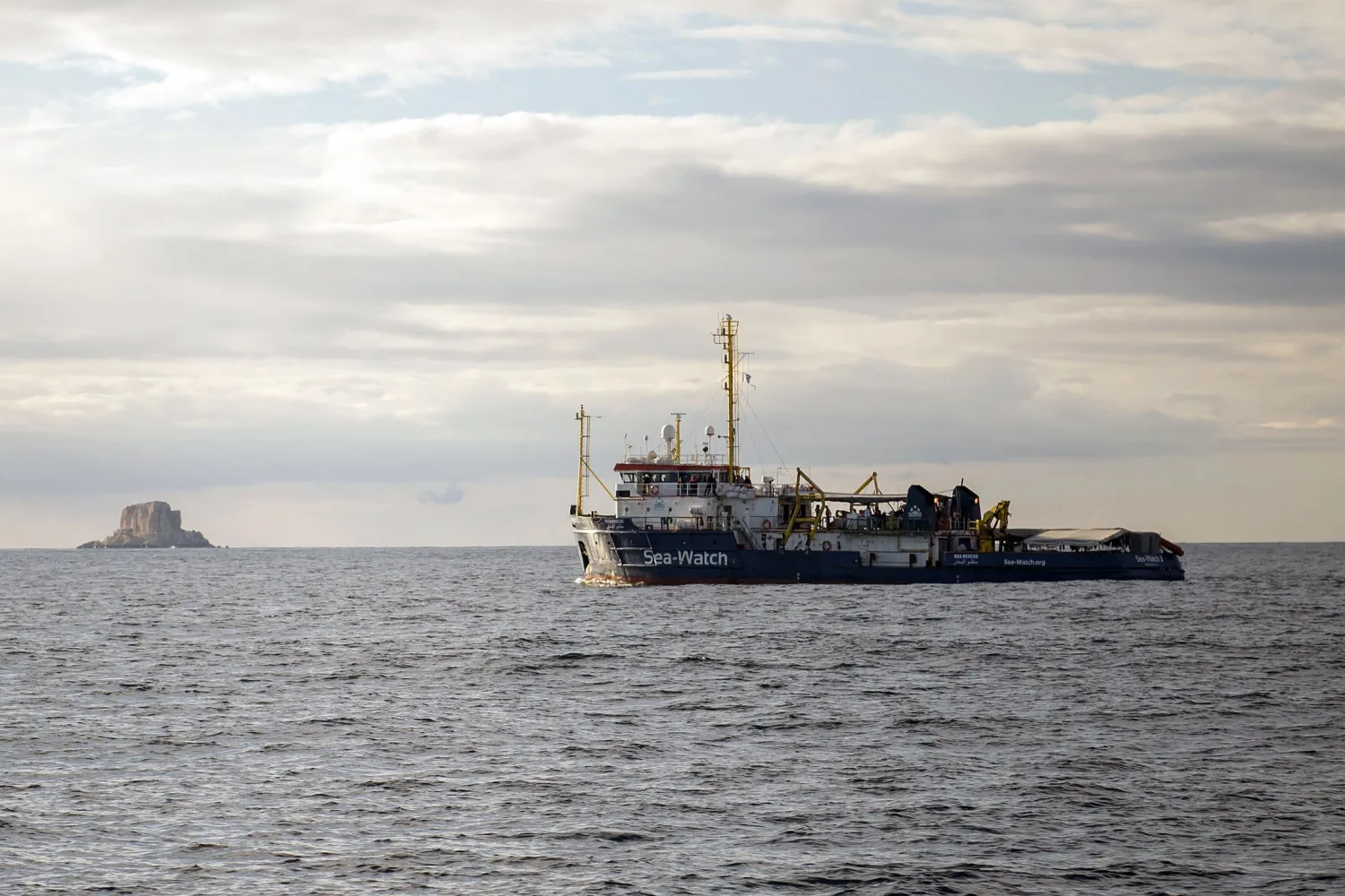 FILE - In this Tuesday, Jan. 8, 2018 filer, the Sea-Watch rescue ship waits off the coast of Malta (AP Photo/Rene Rossignaud, File)