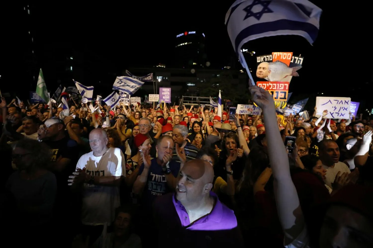 Israelis rally against possible legislation that could grant PM Benjamin Netanyahu immunity from prosecution if he faces corruption charges, in Tel Aviv, Israel May 25, 2019. (Reuters)