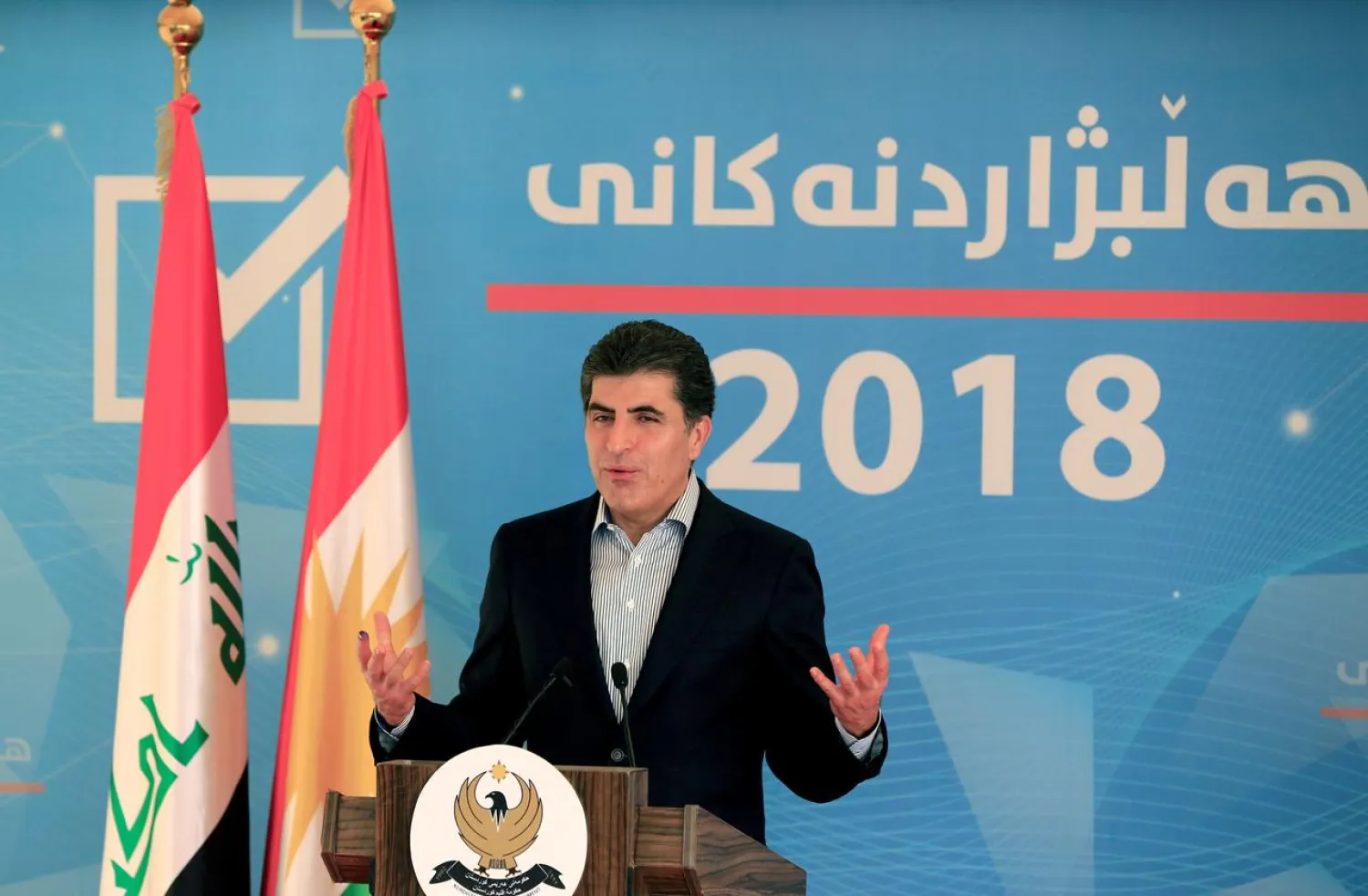FILE PHOTO: Nechirvan Barzani speaks during a news conference after casting his vote in Erbil during parliamentary elections in the semi-autonomous region of Iraq, September 30, 2018. REUTERS/Thaier Al-Sudani/File Photo
