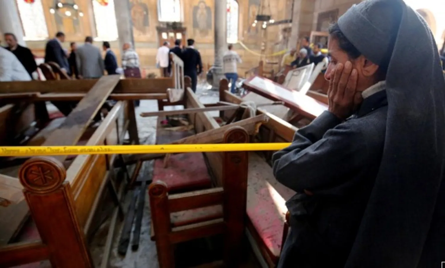  A nun cries at the scene of the bombing inside Cairo's Coptic cathedral, December 11, 2016. REUTERS/Amr Abdallah Dalsh/File Photo
