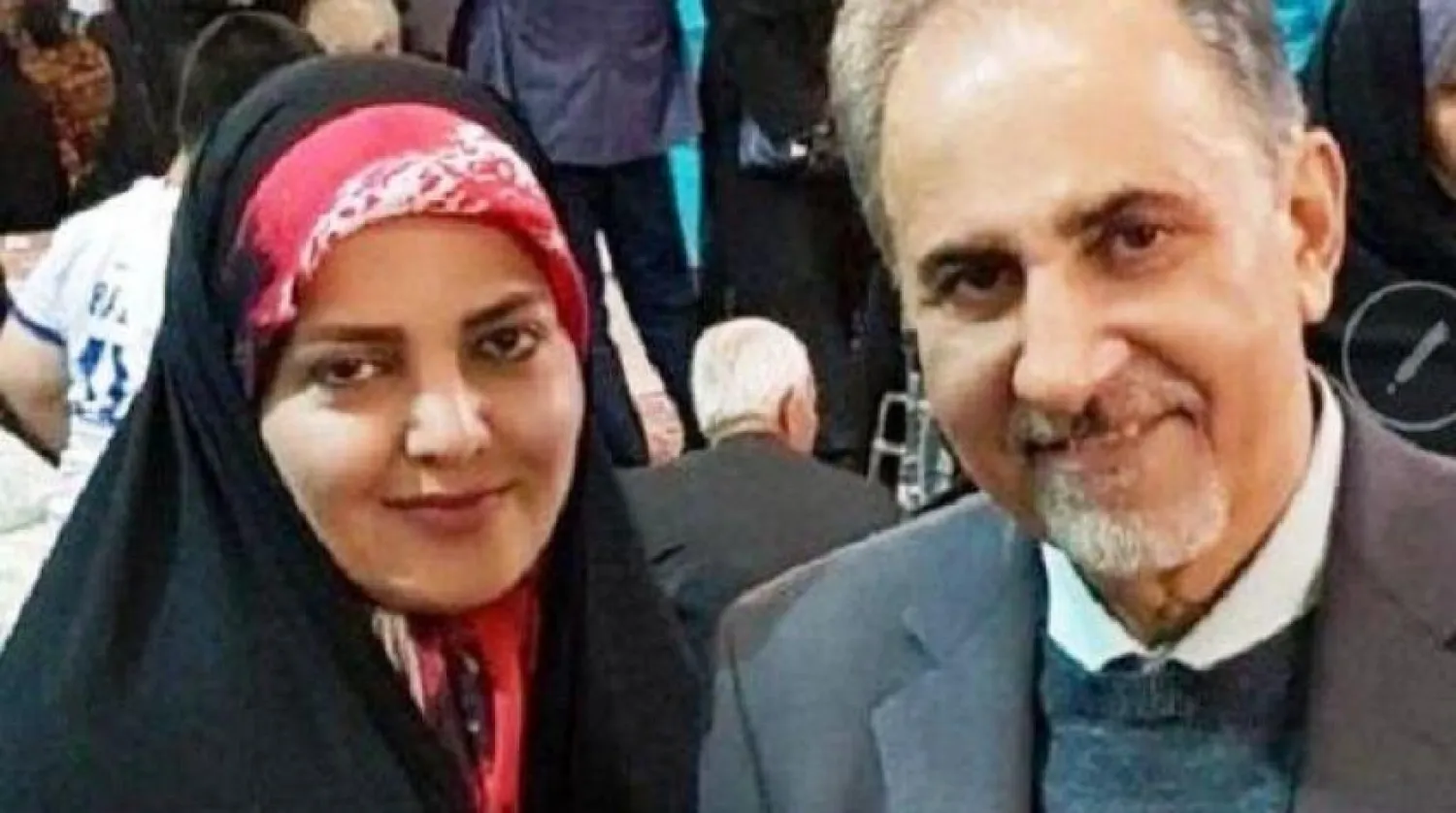 File photo of Mohammad Ali Najafi and his wife