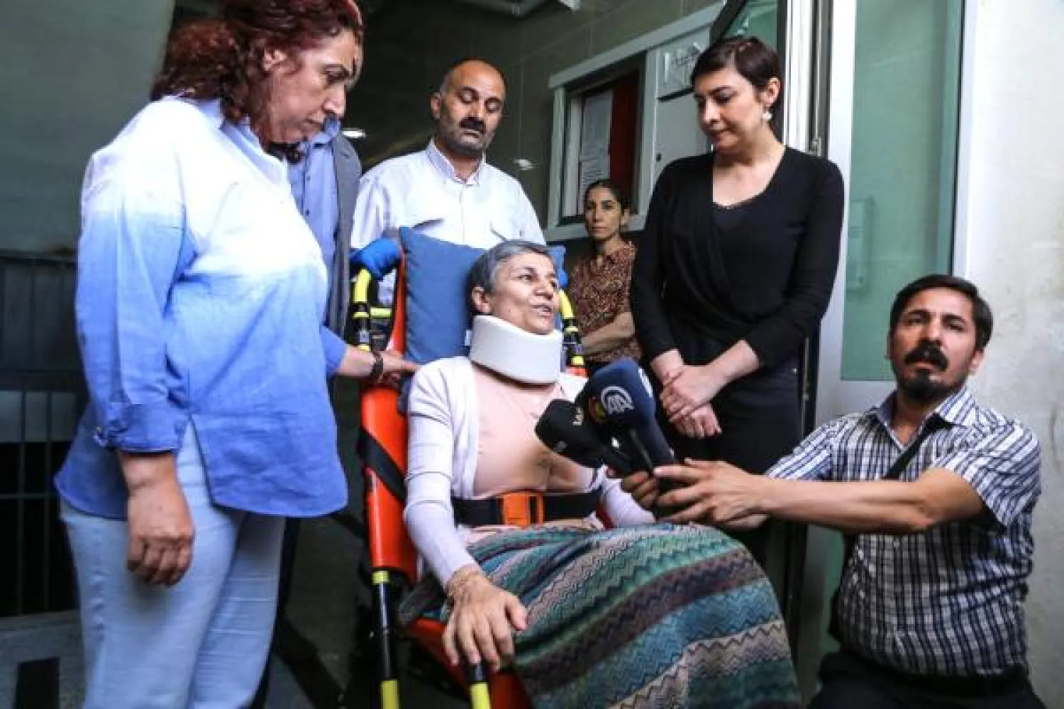 Pro-Kurdish Peoples' Democratic Party (HDP) deputy Leyla Guven, who was jailed for a short while and who initially launched a hunger strike which other detainees then followed suit, speaks to the media as she leaves her home to go to a hospital on May 26, 2019 in Diyarbakir - AFP