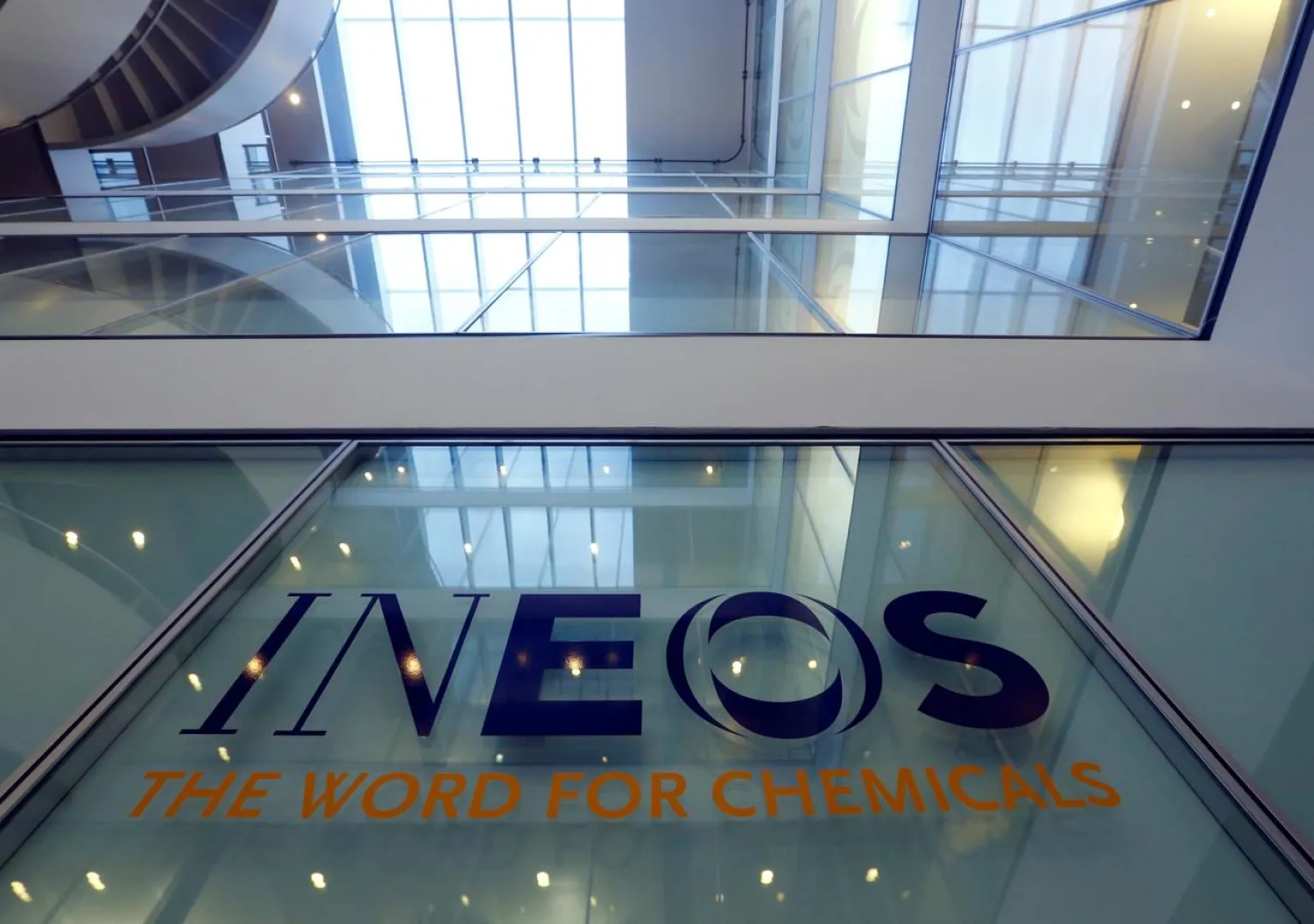 FILE PHOTO: A logo is pictured in the headquarters of INEOS chemicals company in Rolle, Switzerland, November 13, 2017. REUTERS/Denis Balibouse