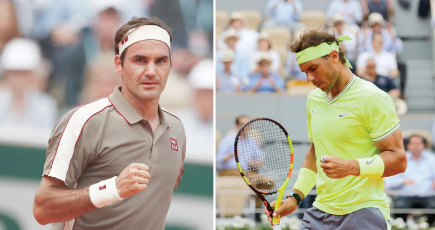 نادال (أ.ف.ب)  -  فيدرر (رويترز)