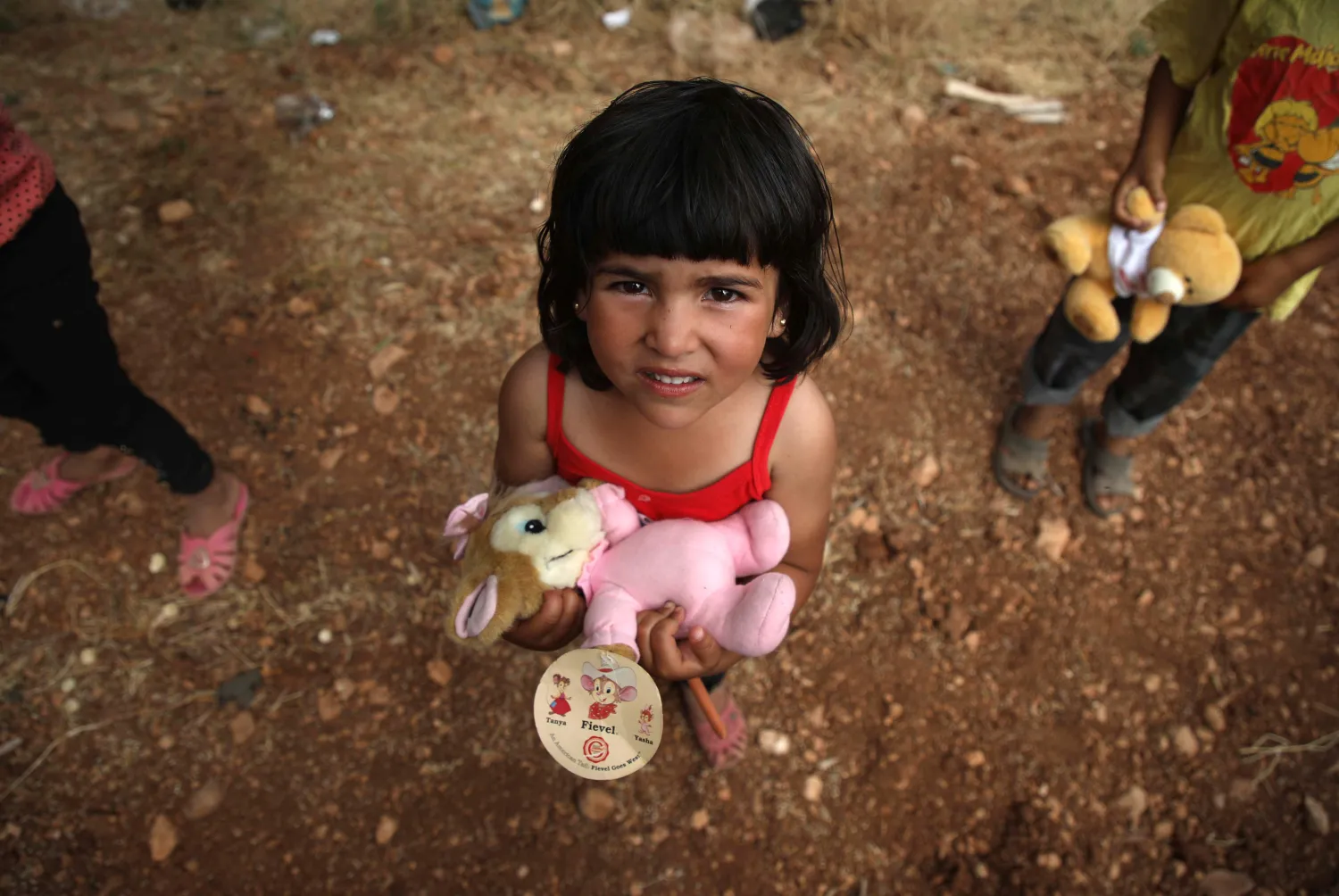 طفلة سورية تحتفل بعيد الفطر في إدلب (أ.ف.ب)