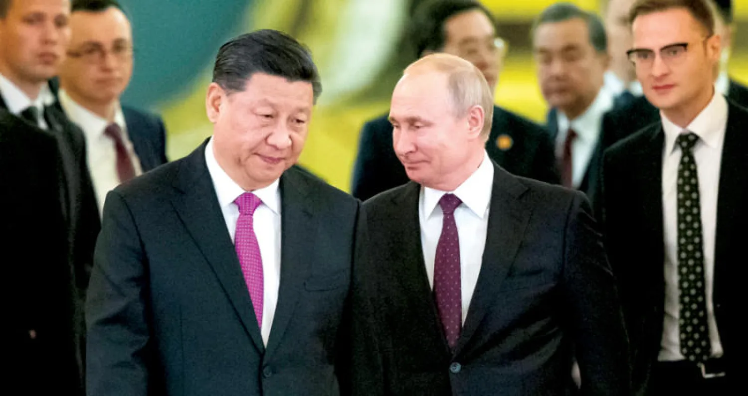 بوتين وشي لدى اجتماعهما في الكرملين أمس (أ.ب)