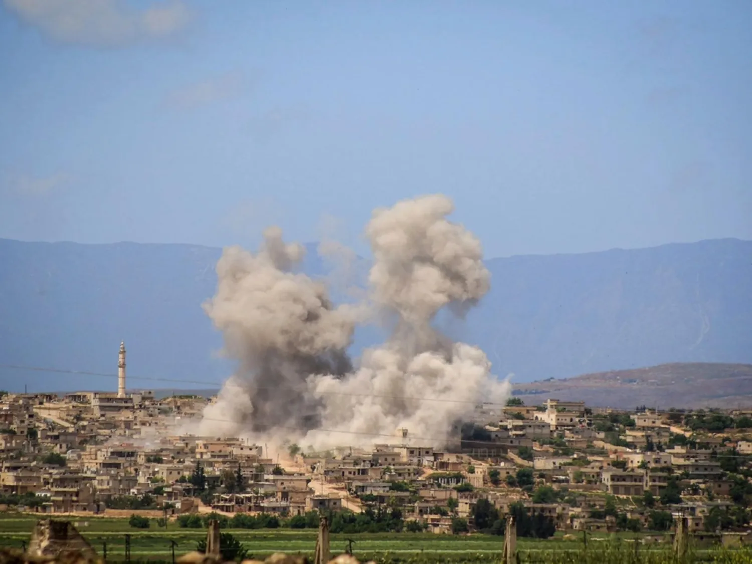Smoke rises from Al Habeet in Idlib governorate after Syrian and Russian air strikes on the opposition-held Syrian town May 3, 2019. AP