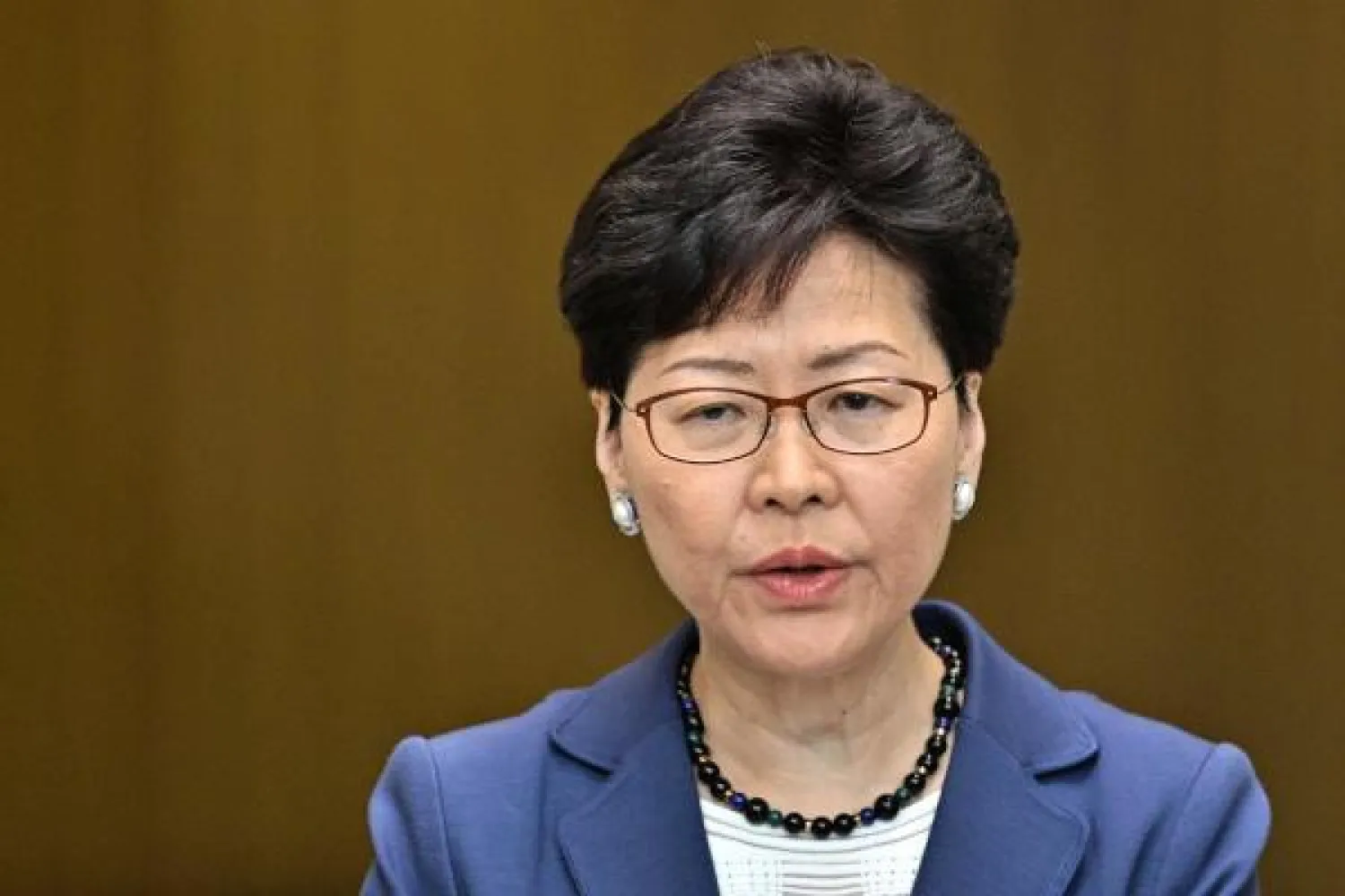 الرئيسة التنفيذية لهونغ كونغ كاري لام خلال مؤتمر صحافي عقدته اليوم (ا.ف.ب)