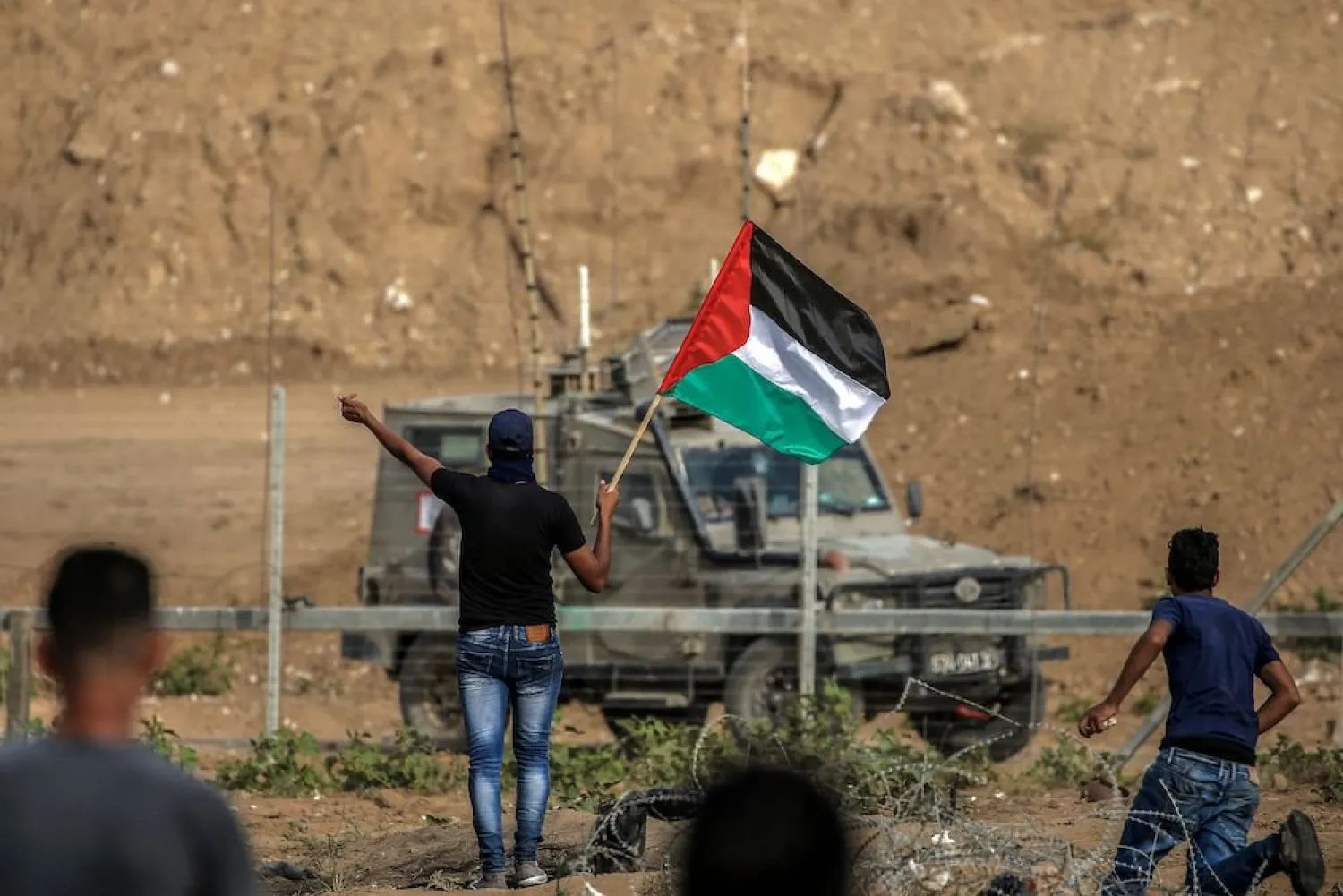 Palestinian protesters in Gaza. (AFP)