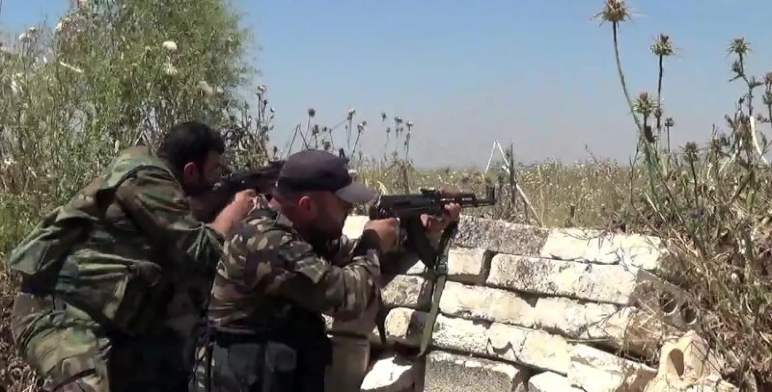 أفراد من الجيش السوري في ريف حماة (سانا)