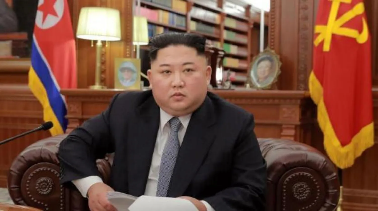 Kuzey Kore lideri Kim’in kız kardeşi  Kim Yeo-jong, Güney Kore Başkanlık Güvenliği Direktörü ile (EPA)