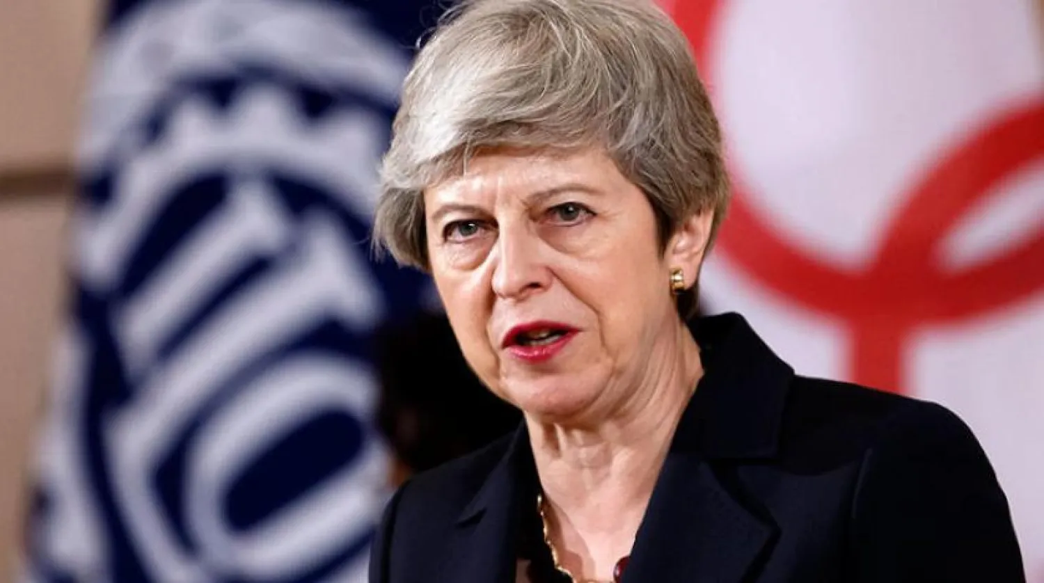 Theresa May, Uluslararası Çalışma Örgütü’nün (ILO) kuruluşunun yüzüncü yıl dönümü törenindeki konuşmasında “modern kölelik” uyarısında bulundu (EPA)