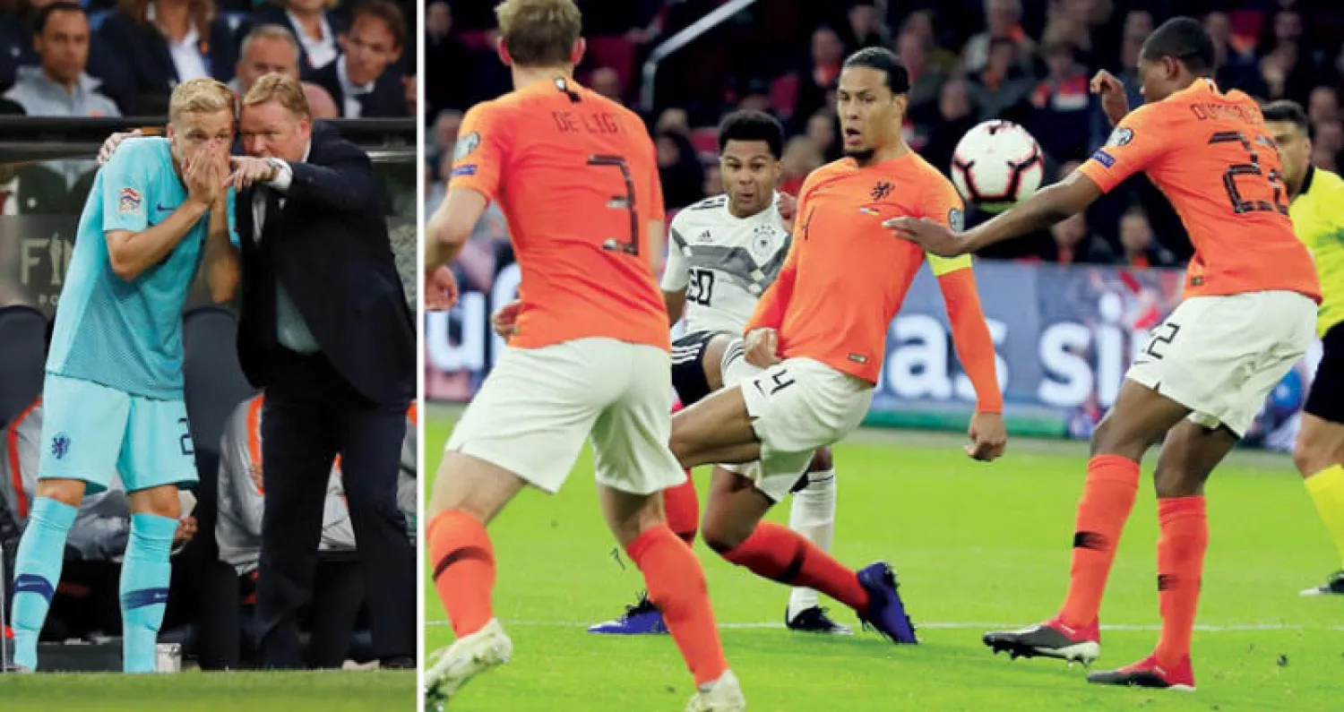 فان دايك لم يستطع منع لاعب ألمانيا سيرجي غنابري من التسجيل في المواجهة التي شهدت هزيمة هولندا  -  كومان ودوني فان دي بيك في نهائي دوري الأمم الأوروبية (رويترز)