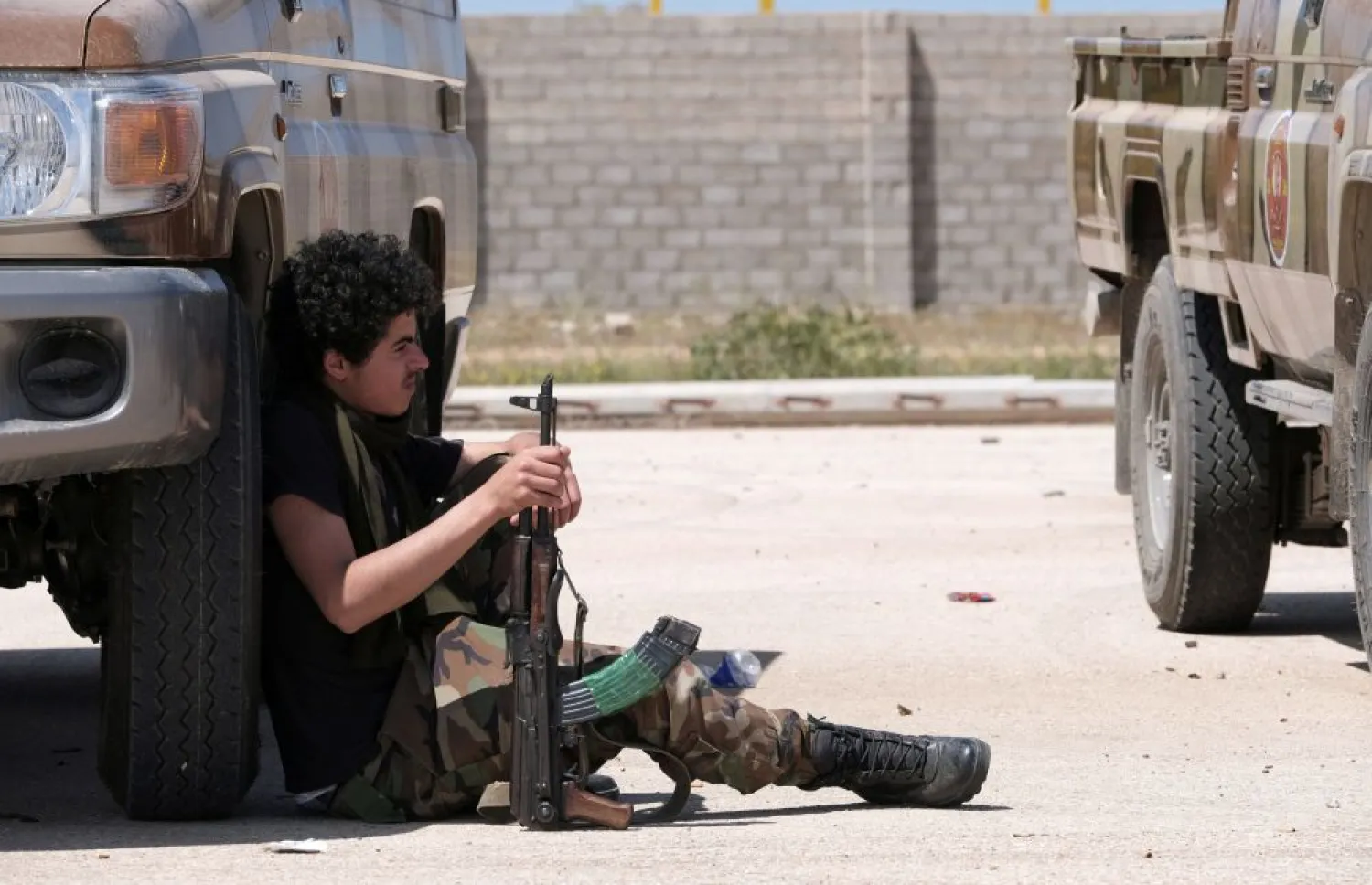 A member of LNA holds his weapon as he heads out of Benghazi to reinforce the troops advancing to Tripoli, in Benghazi, Libya April 7, 2019. (Reuters)
