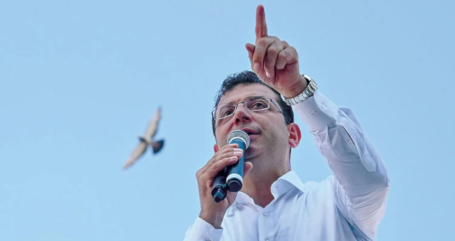 مرشح المعارضة التركية لرئاسة بلدية إسطنبول أكرم إمام أوغلو قال إنه يعمل لإيجاد حل للأزمة في سوريا وإنهاء الوضع  الذي يجد الناس فيه أنفسهم مضطرين لهجرة بلدهم (أ.ف.ب)