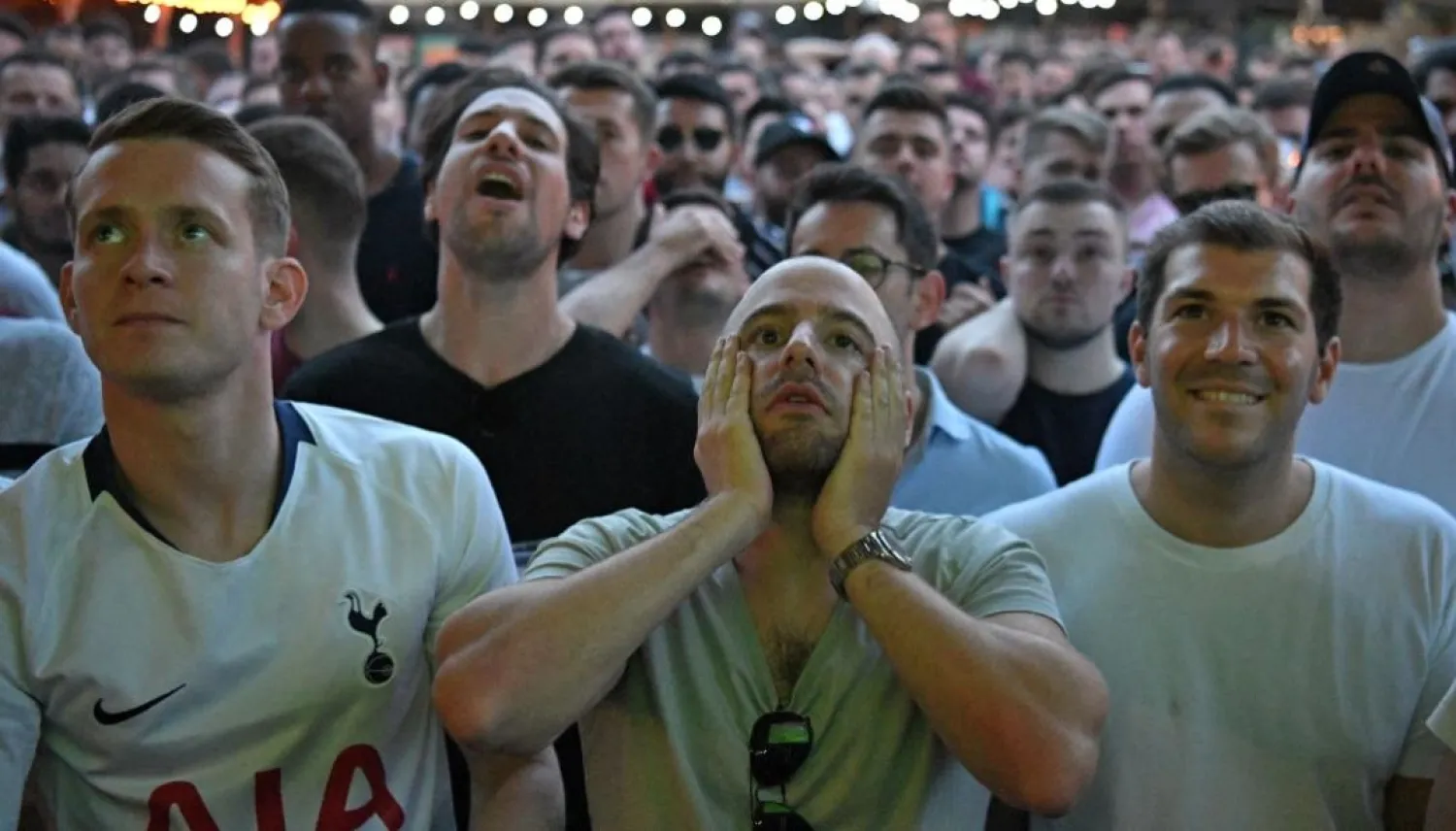 Tottenham fans react as they watch the Champions League final at Flat Iron Square in London. (Getty Images)