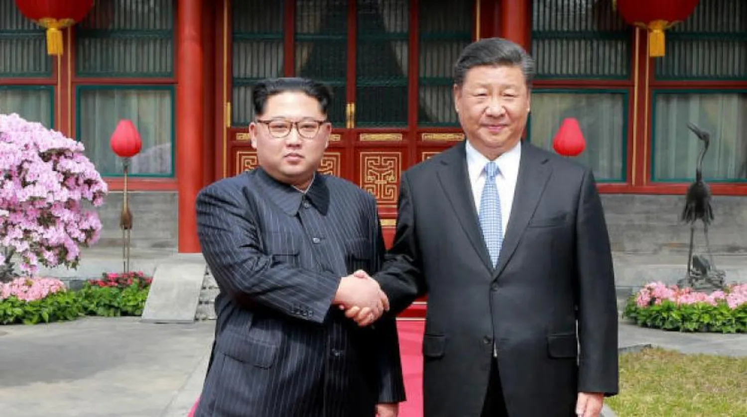 Kuzey Kore lideri Kim Jong-un ilk Çin ziyaretinde Çin Devlet Başkanı Şi Jinping ile