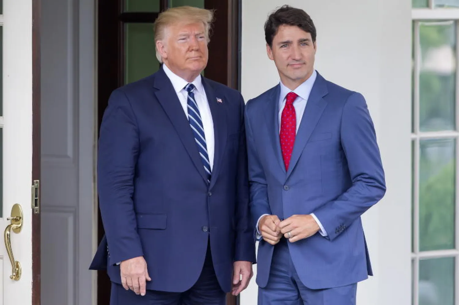 الرئيس الأميركي دونالد ترمب ورئيس الوزراء الكندي جاستن ترودو (إ.ب.أ)