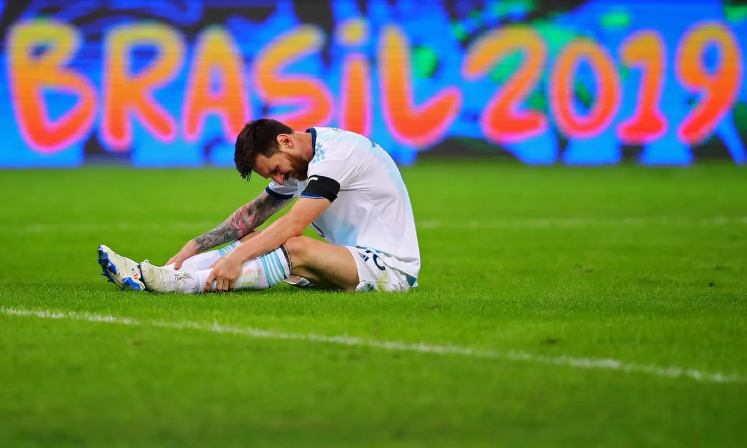  Lionel Messi looks pained during Argentina’s Copa América draw against Paraguay, which followed a defeat by Colombia. Photograph: Chris Brunskill/Fantasista/Getty Images
