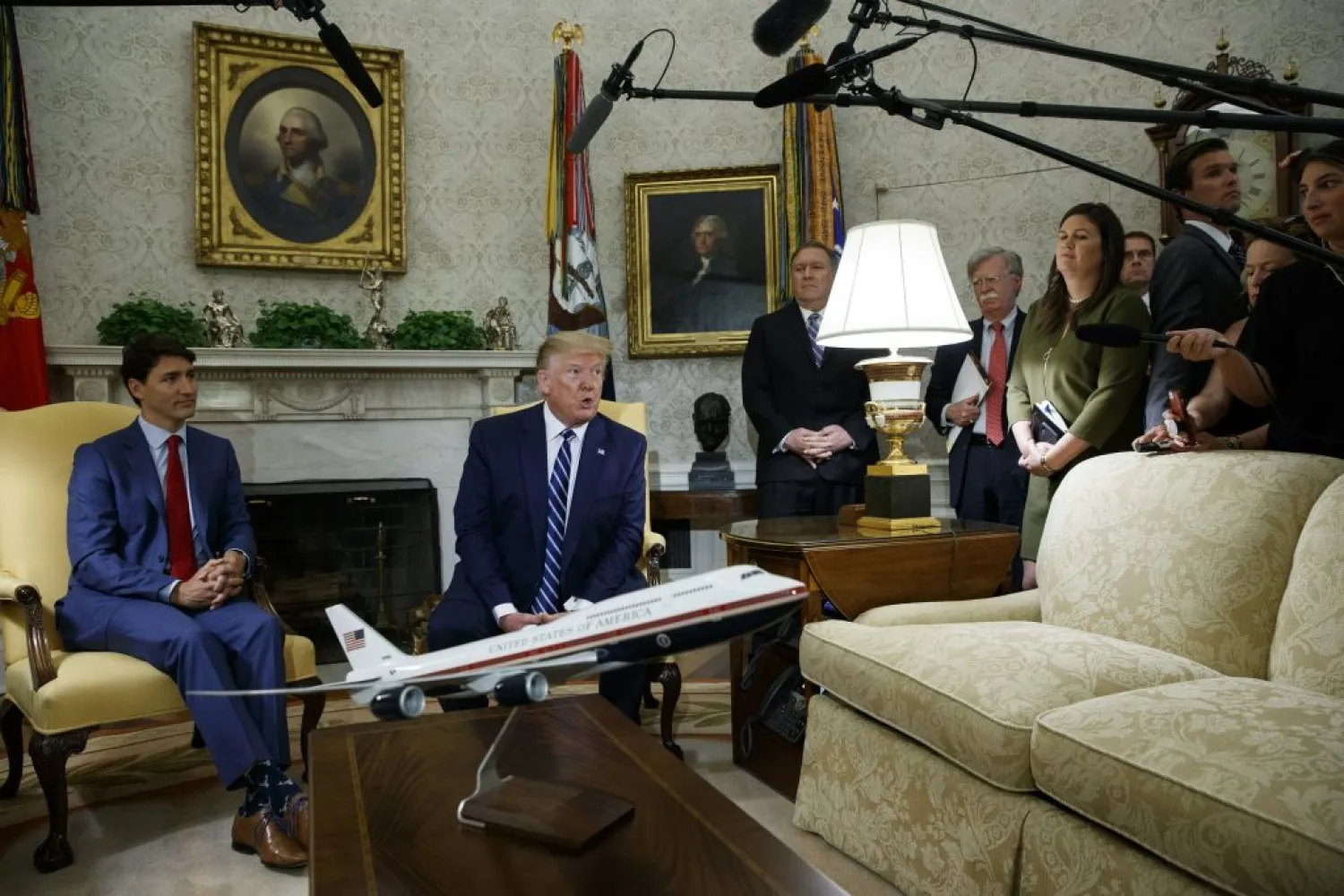 President Donald Trump talks to reporters during a meeting with Canadian Prime Minister Justin Trudeau in the Oval Office of the White House, Thursday, June 20, 2019, in Washington. (AP Photo/Evan Vucci)
