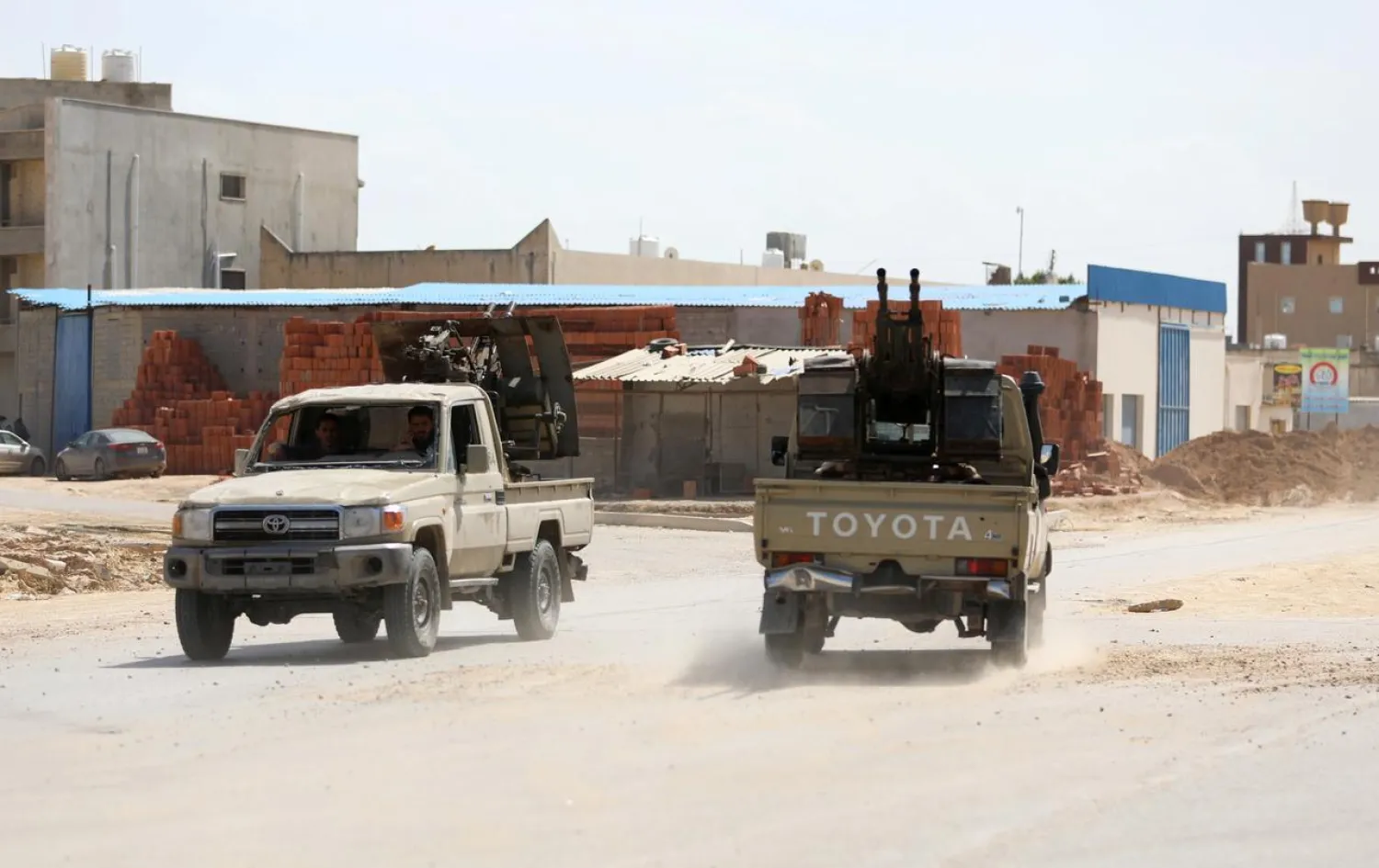 Pro-GNA forces are seen in military vehicles on the outskirts of Tripoli, Libya April 10, 2019. REUTERS/Hani Amara
