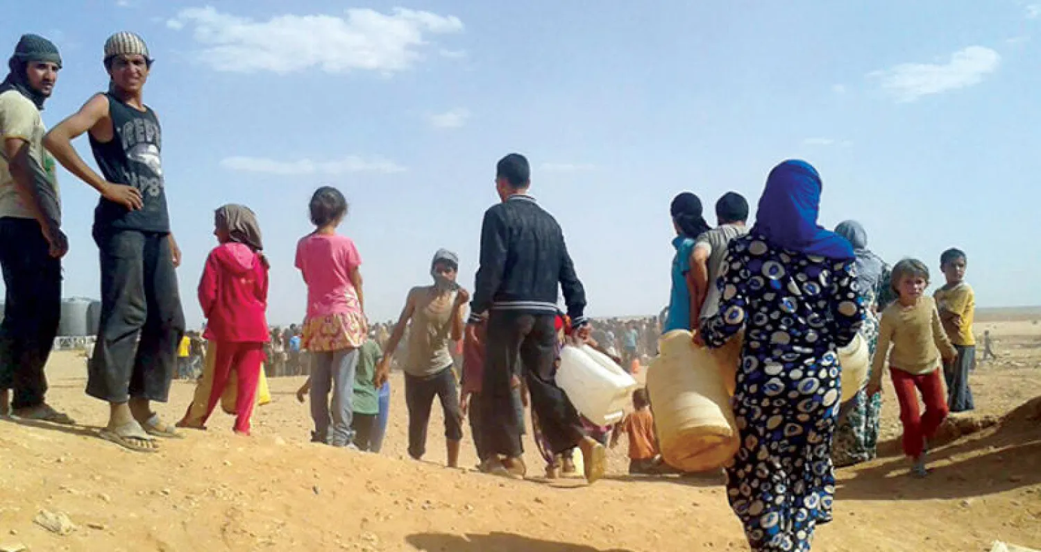 مخيم الركبان الصحراوي الذي يضم نازحين سوريين قرب الحدود السورية الأردنية العراقية (أ.ب)