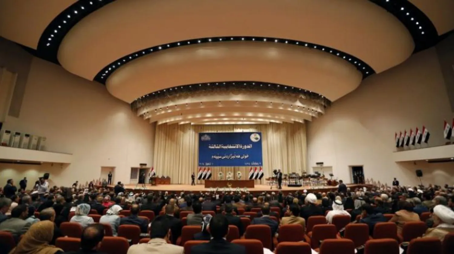 Members of the new Iraqi parliament attend a session at the parliament headquarters in Baghdad (Reuters)