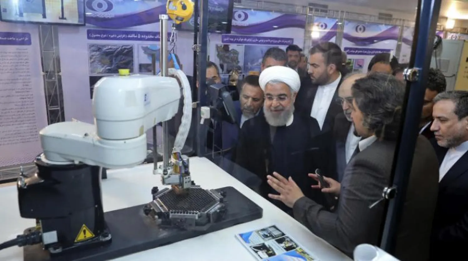 İran Cumhurbaşkanı Hasan Ruhani, Tahran’daki Ulusal Nükleer Teknoloji Günü kutlamalarında (AP)