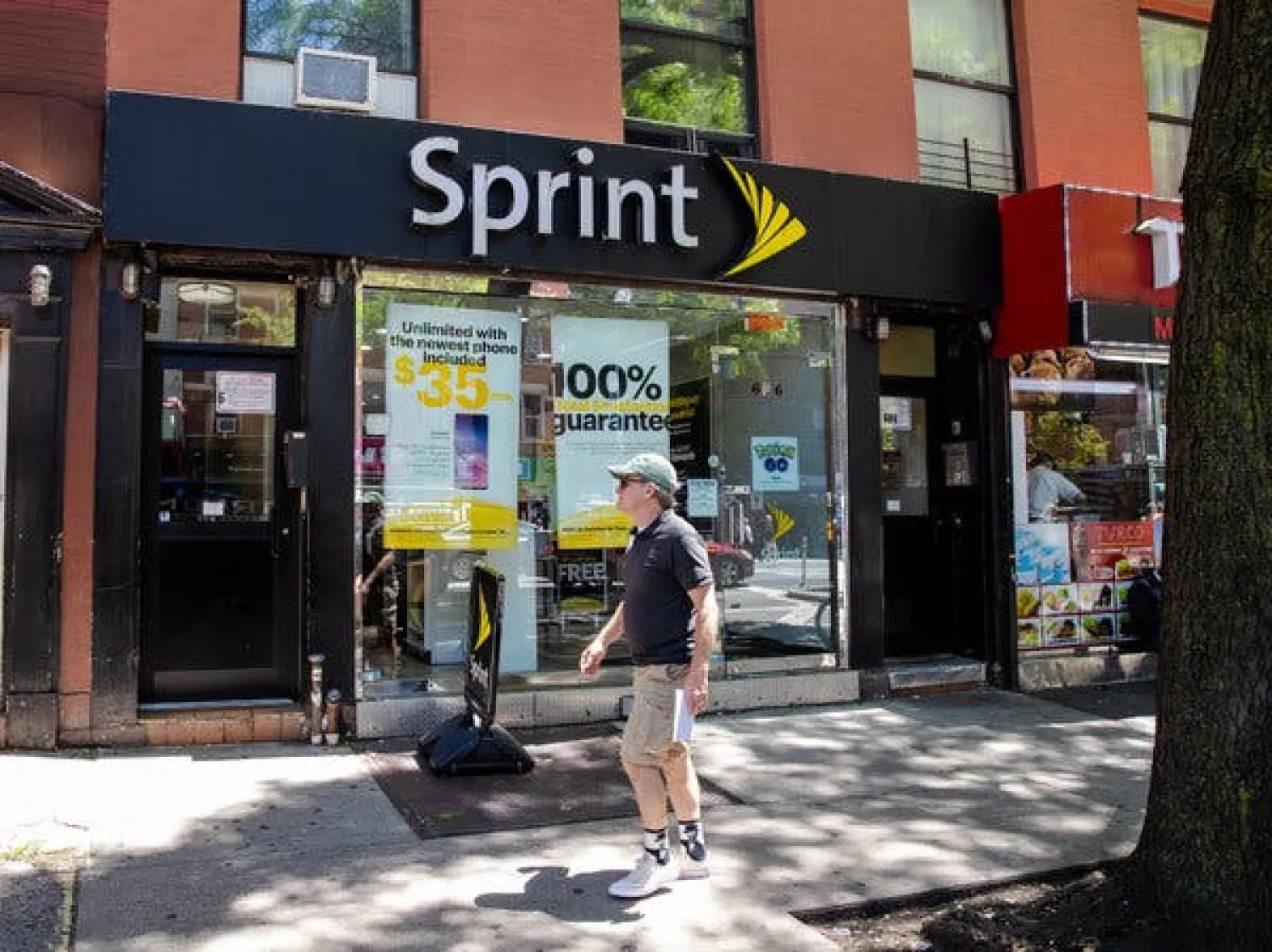 The Justice Department is pushing Sprint and T-Mobile to sell Boost Mobile and wireless frequencies, people familiar with a potential agreement said.CreditCreditBrittainy Newman/The New York Times
