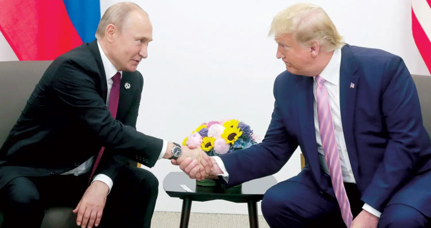 الرئيسان بوتين وترمب خلال لقاء على هامش قمة أوساكا (إ.ب.أ)