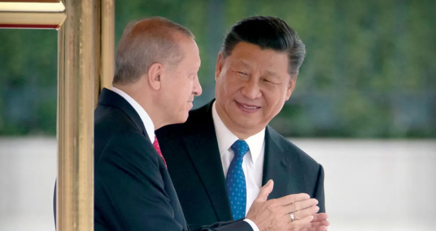 شي لدى استقباله إردوغان في بكين الثلاثاء الماضي (أ.ب)