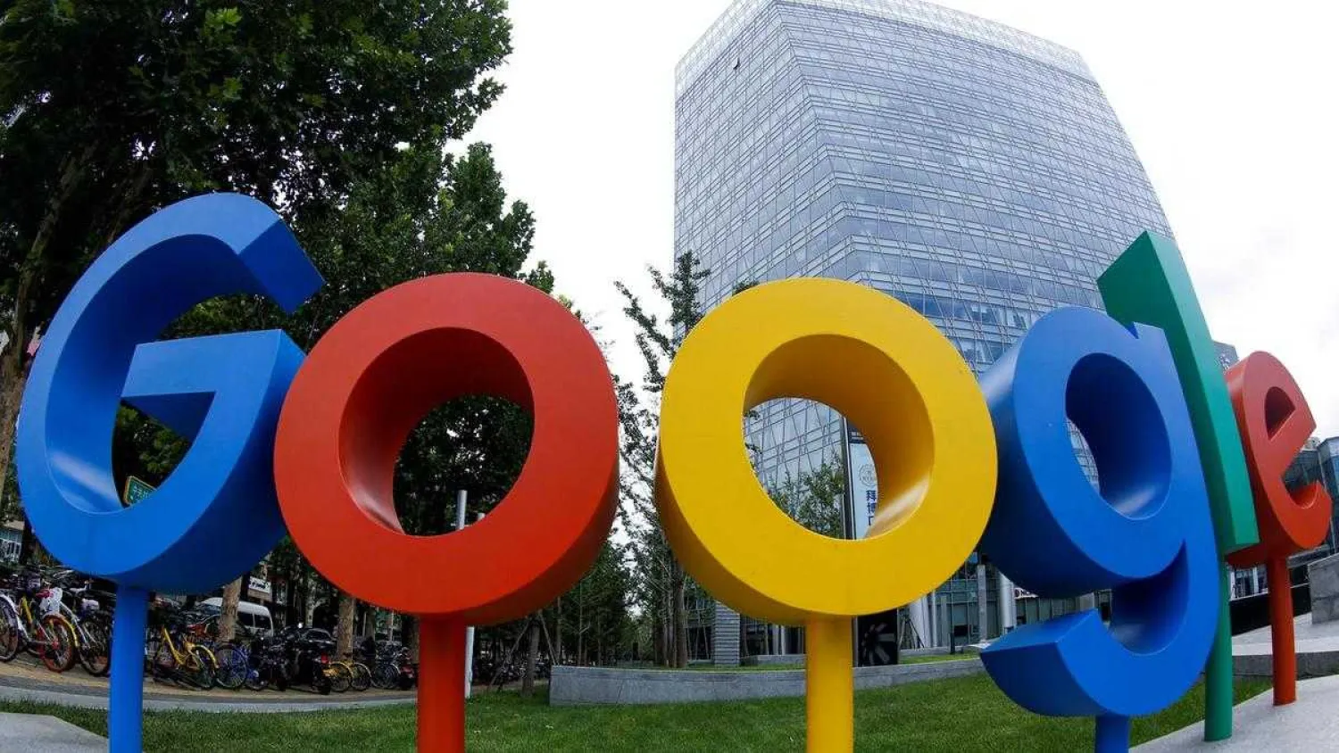 The brand logo of Alphabet Inc's Google is seen outside its office in Beijing. REUTERS/Thomas Peter
