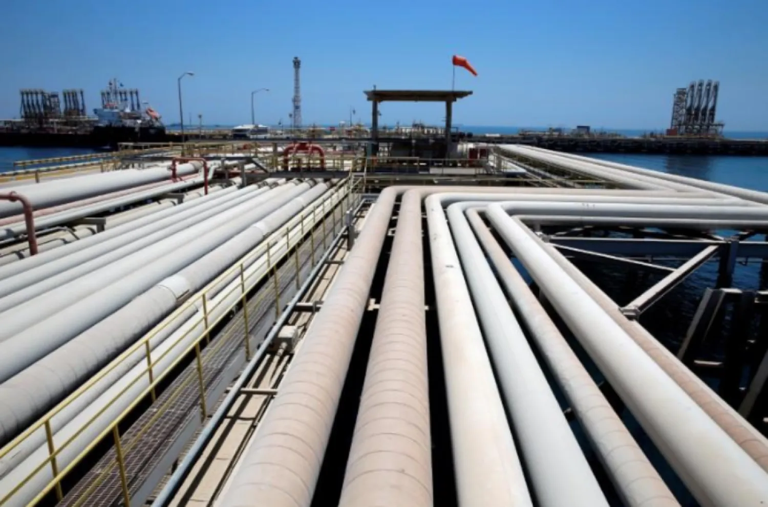 FILE PHOTO: An oil tanker is being loaded at Saudi Aramco's Ras Tanura oil refinery and oil terminal in Saudi Arabia May 21, 2018. REUTERS/Ahmed Jadallah/File Photo