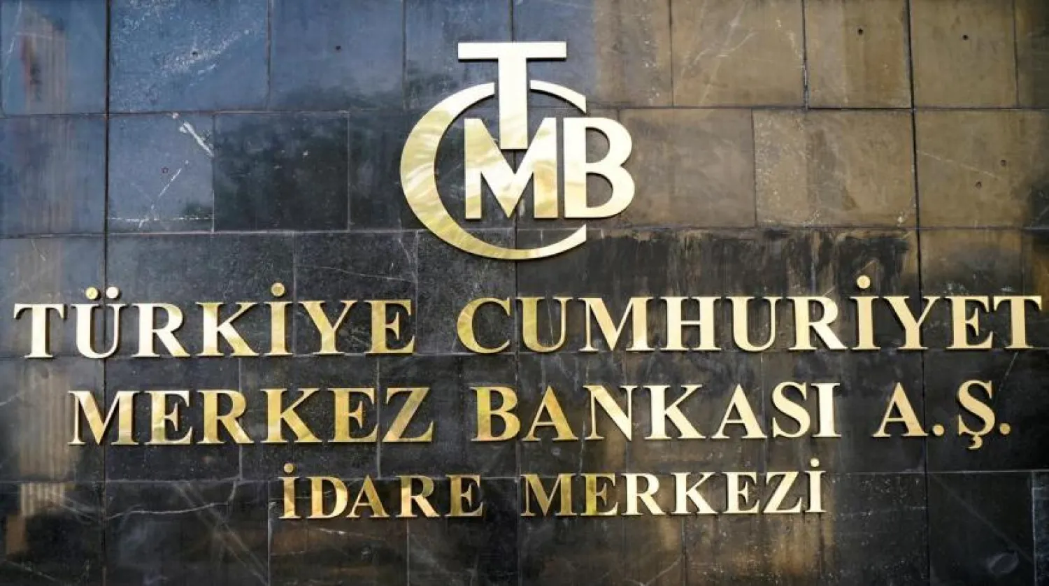 FILE PHOTO: A logo of Turkey's Central Bank (TCMB) is pictured at the entrance of the bank's headquarters in Ankara, Turkey April 19, 2015. REUTERS/Umit Bektas
