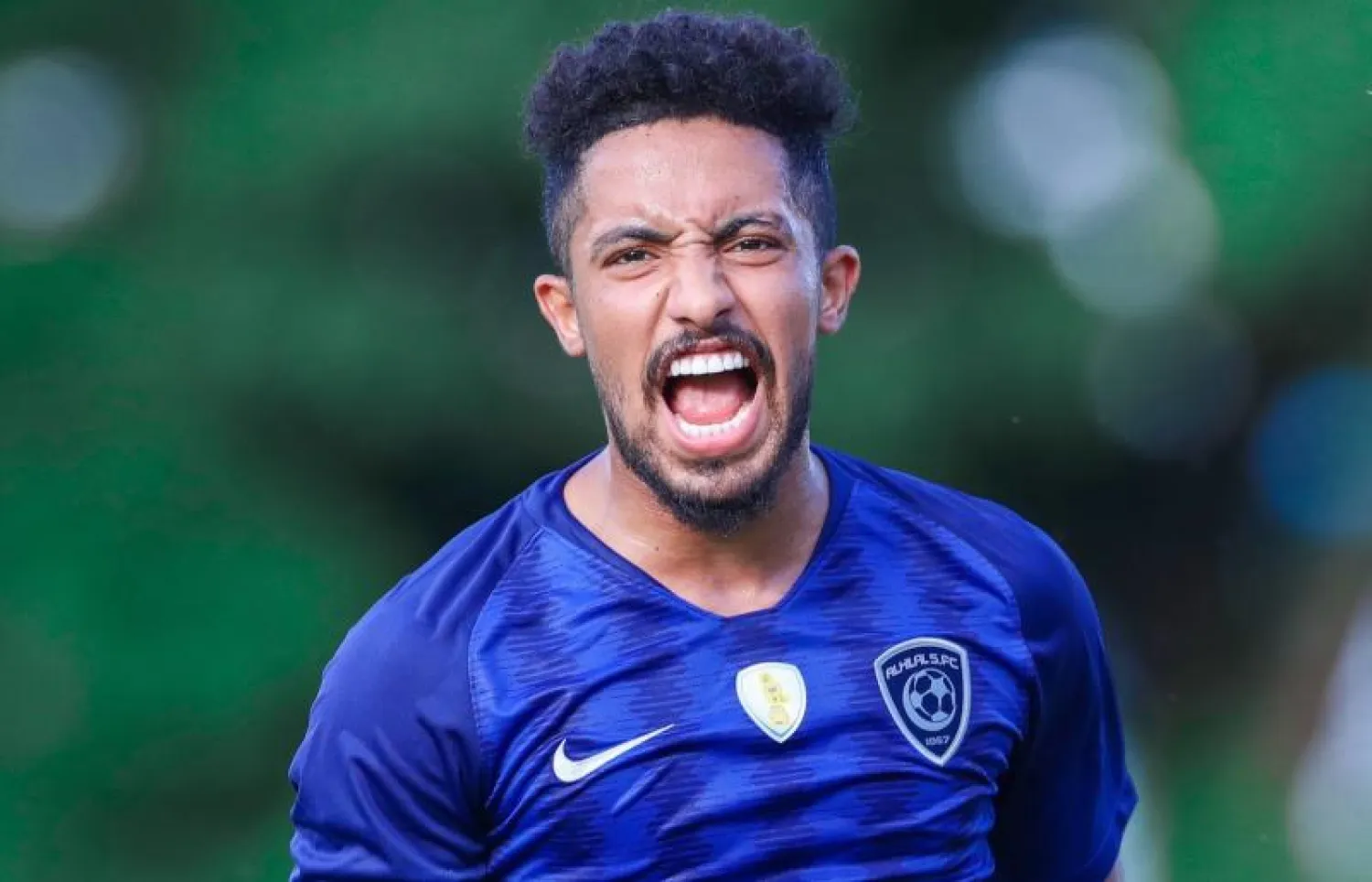 هتان باهبري لاعب الهلال السعودي يحتفل بهدفه في مرمى فريق سبيتال دراو النمساوي (المركز الإعلامي لنادي الهلال)