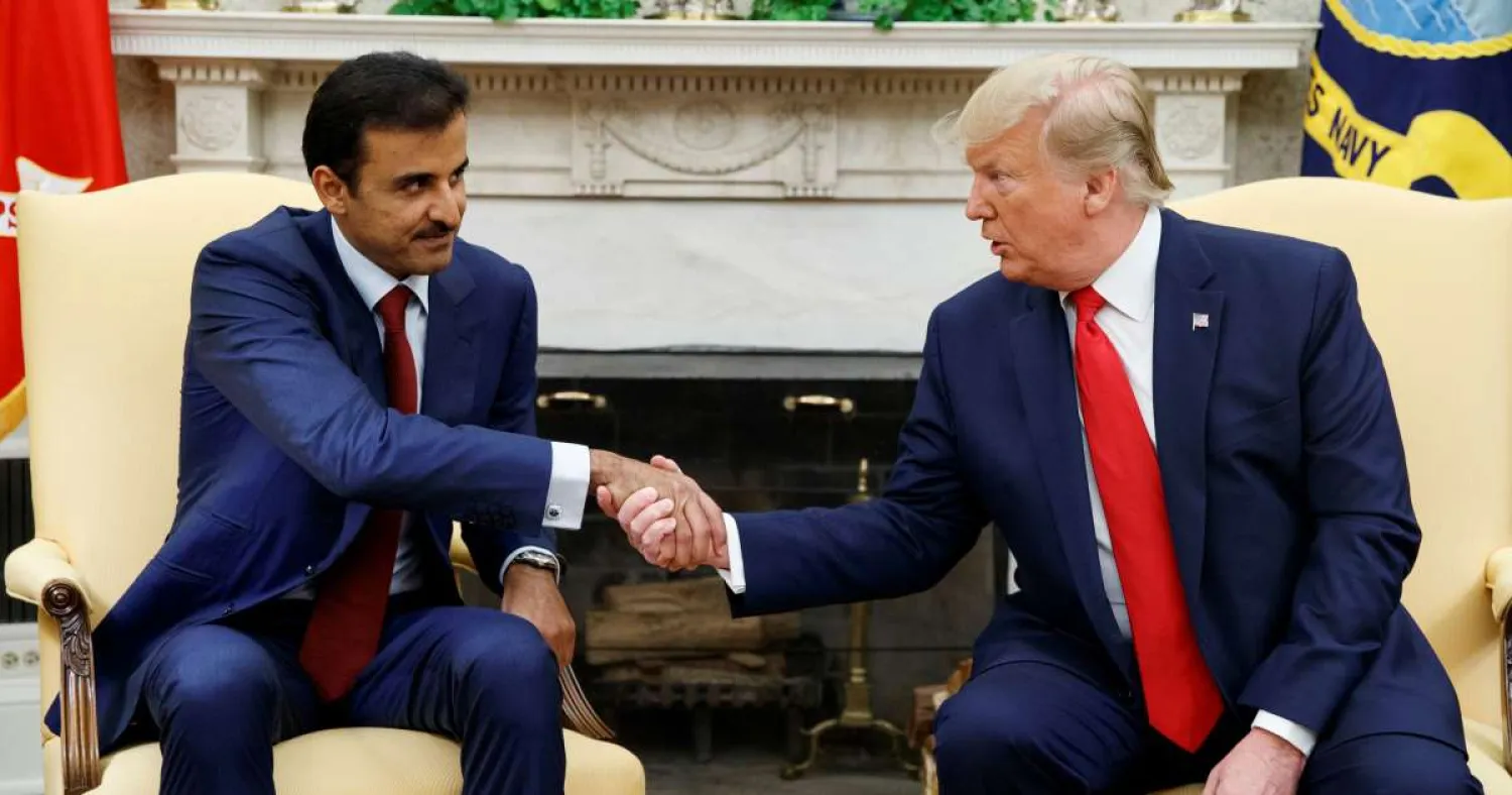 President Donald Trump shakes hands with Qatar's Emir Sheikh Tamim bin Hamad Al Thani in the Oval Office of the White House, July 9, 2019, in Washington. (AP)