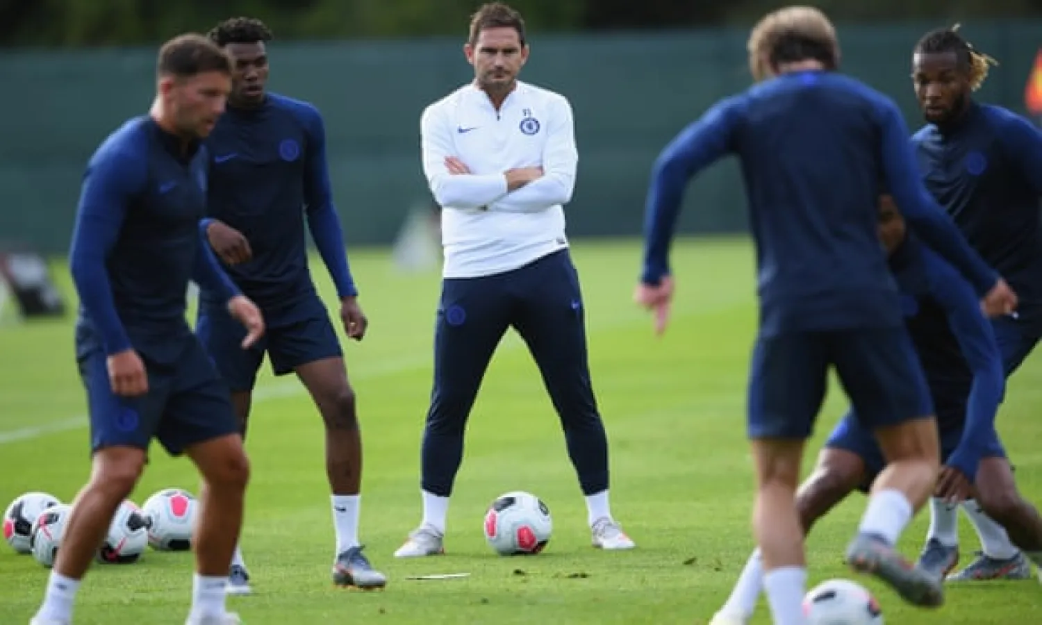  Frank Lampard runs the rule over his new charges during his first training session as Chelsea manager. Photograph: Darren Walsh/Chelsea FC via Getty Images
