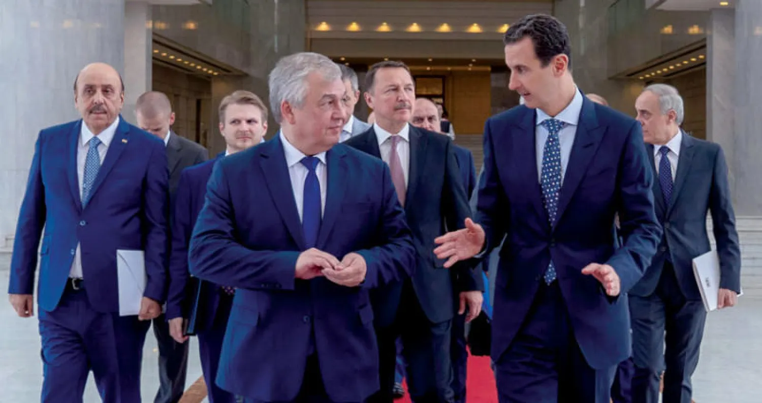 الأسد ومبعوث بوتين بعد محادثاتهما في دمشق أمس (سانا)