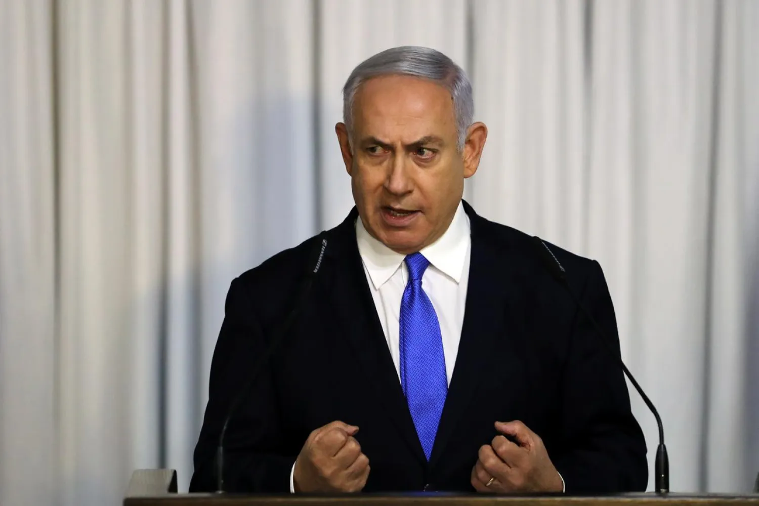 FILE PHOTO : Israeli Prime Minister Benjamin Netanyahu gives a statement to the media in Tel Aviv, Israel February 21, 2019 REUTERS/ Ammar Awad