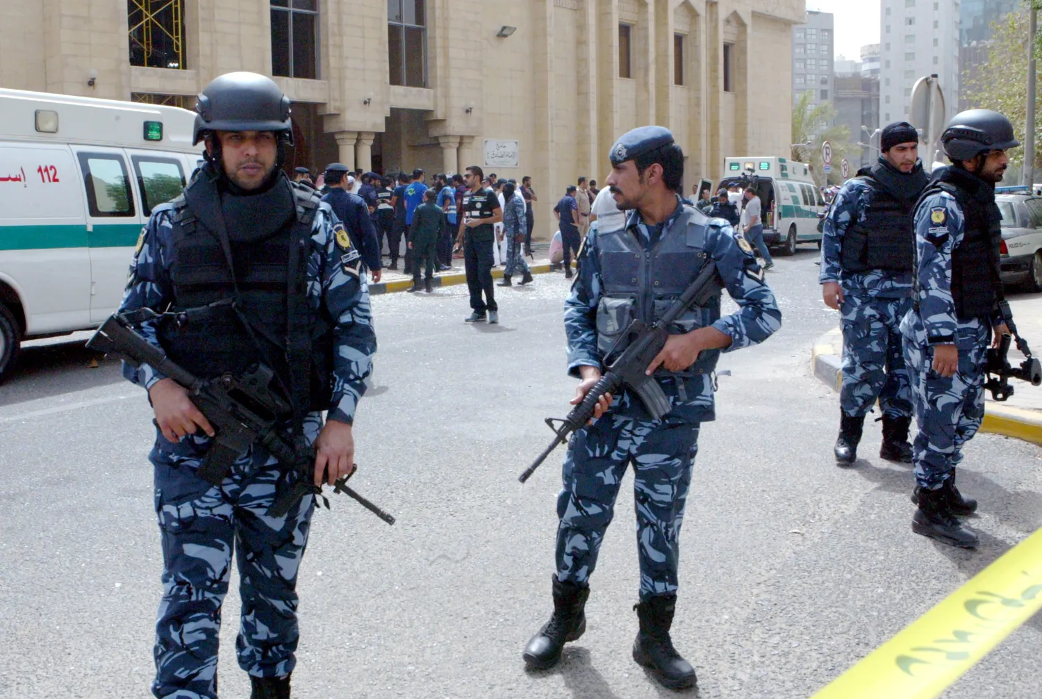  Kuwaiti security forces father outside the Shi’ite al-Imam al-Sadeq mosque in Kuwait City after it was targeted by a suicide bombing during Friday prayers on June 26, 2015 (AFP) 
