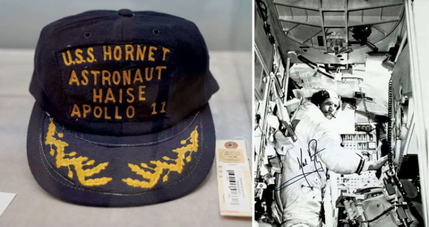 صورة فوتوغرافية لنيل أرمسترونغ تحمل توقيعه وهو ببدلة الفضاء أثناء التدريبات على الهبوط على سطح القمر التقطت قبل شهر من الحدث التاريخي  -  قبعة  من مقتنيات أحد رواد الفضاء تحمل اسم «فرد» من المعروضات في المزاد (أ.ف.ب)
